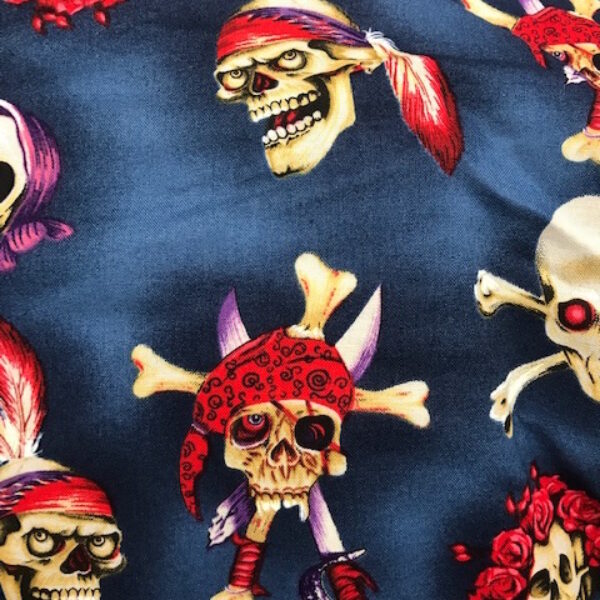 pirate skulls on blue fabric