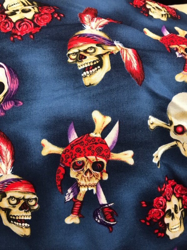 pirate skulls on blue fabric